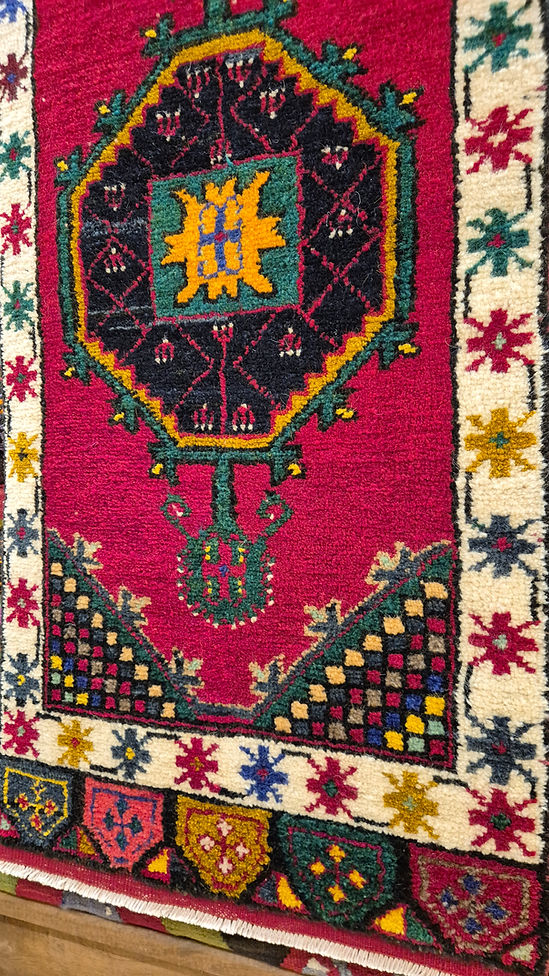 Vintage Akşehir Turkish hand-knotted Yastik rug 1′7″ × 3′8″ in Red, Green, and Ivory, wall-hung decorative textile