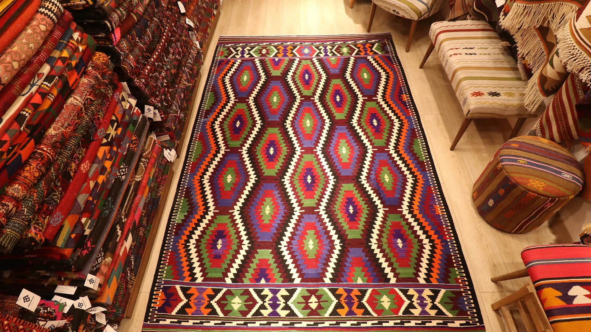 vibrant and vivid colorful Antalya meditteranean kilim rug in tribal diamond and lozenge motifs