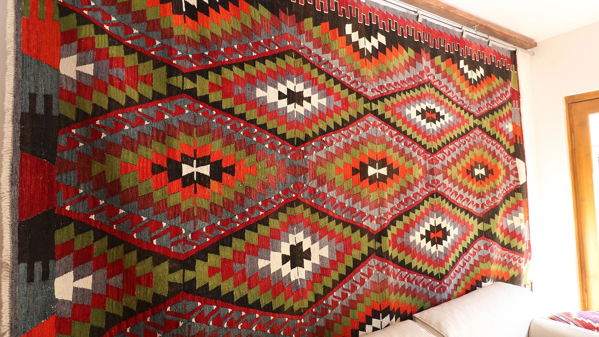 a gorgeous and magnificent vintage Turkish flat-weave rug in rustic tones from Antalya, handpicked by Kilim Couture New York