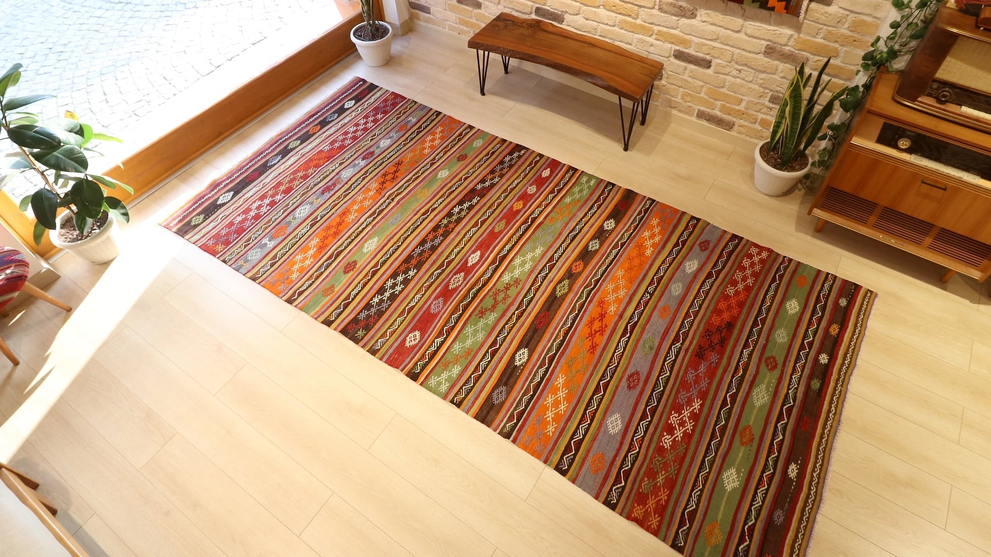 1960s large hallway runner rug in rustic earth tones such as brown, red, orange, gray, and green by Kilim Couture New York