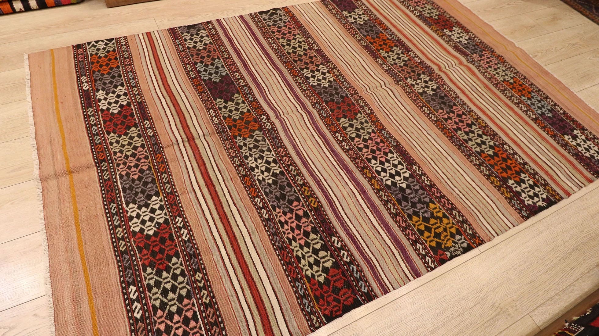 perfect handwoven Turkish neutral flat rug in muted color palette by Kilim Couture New York rug gallery