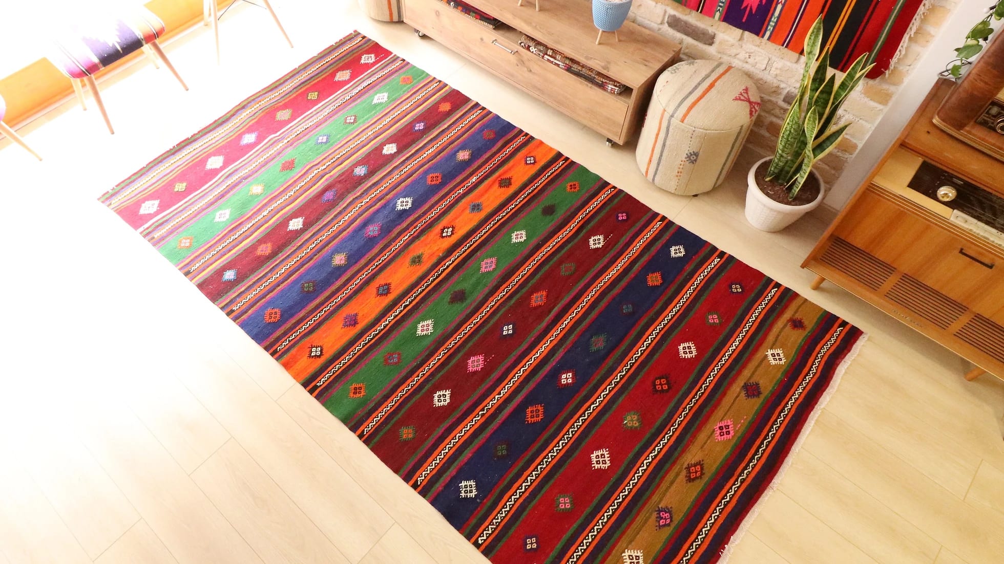 authentic Anatolian flat-woven rug in terracotta, orange, navy, taupe, and green