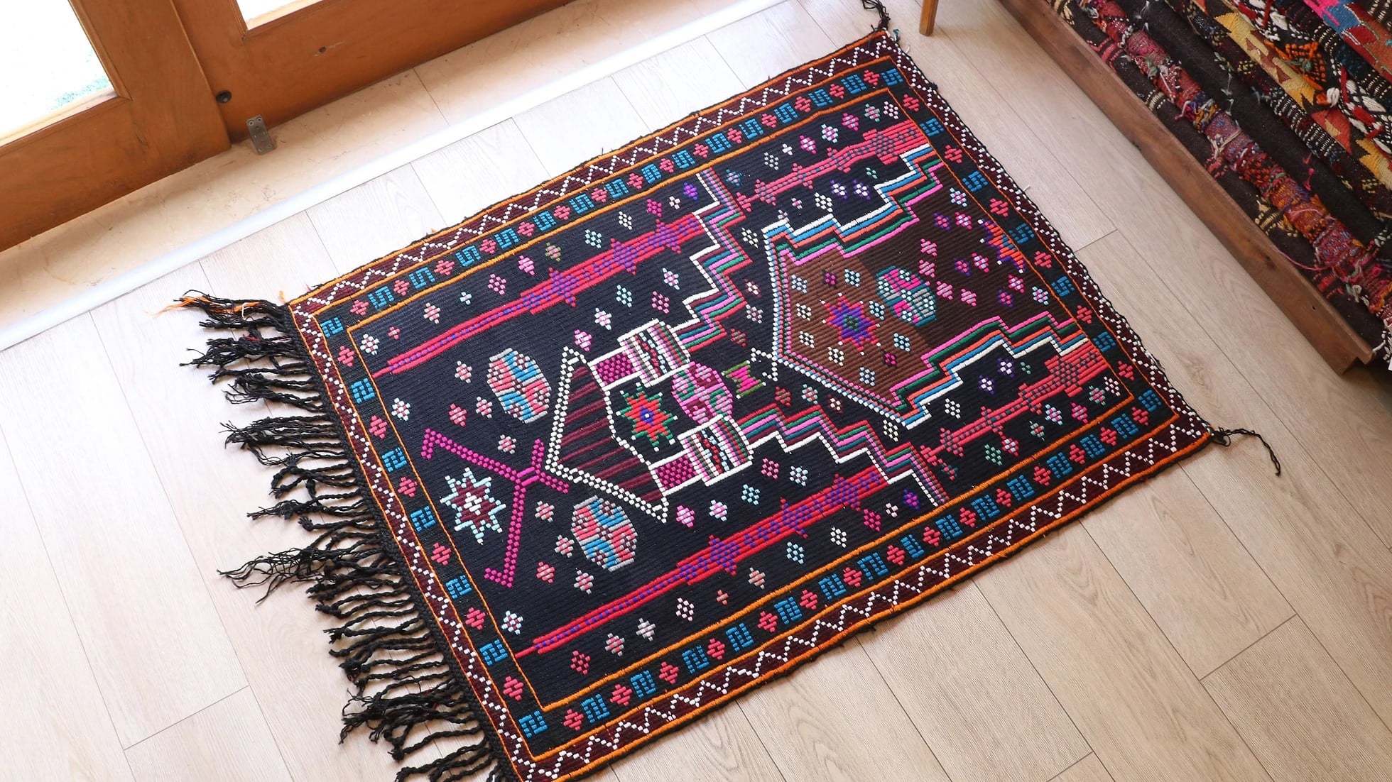 vintage handwoven Cecim Kilim prayer small area rug in gorgeous fuchsia and amethyst colors with black tassels