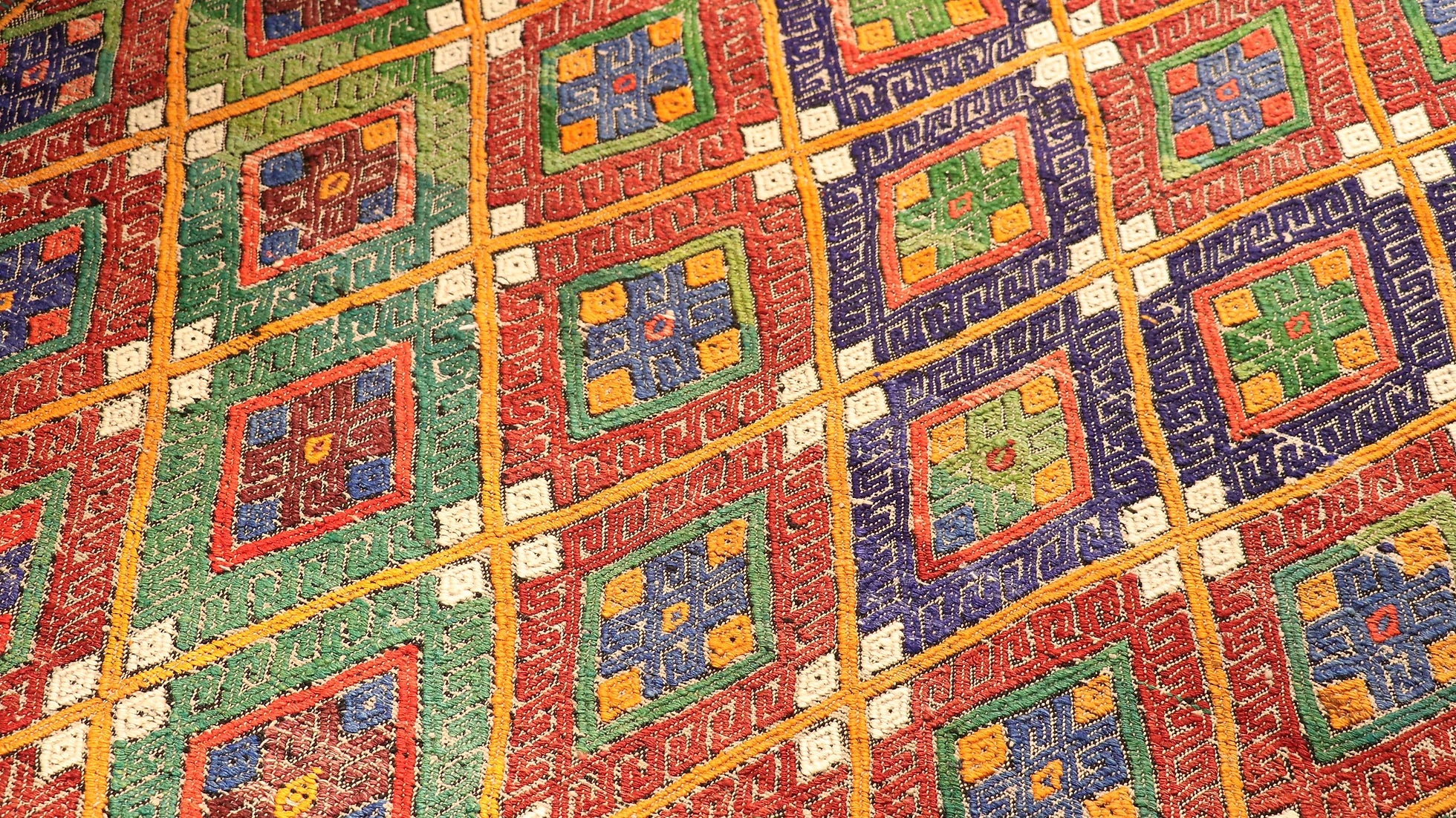 vintage Turkish embroidered style Cecim Kilim rug in pastel hues in detail