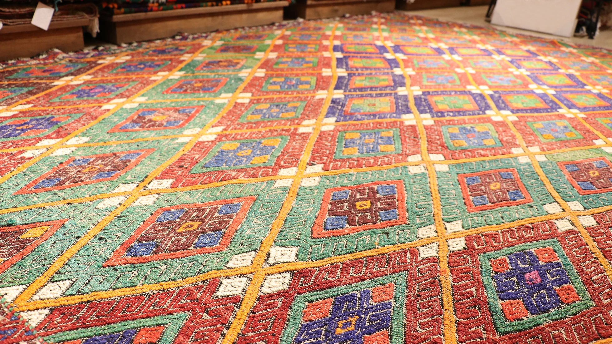 vintage Turkish embroidered style Cecim Kilim rug in pastel hues in detail