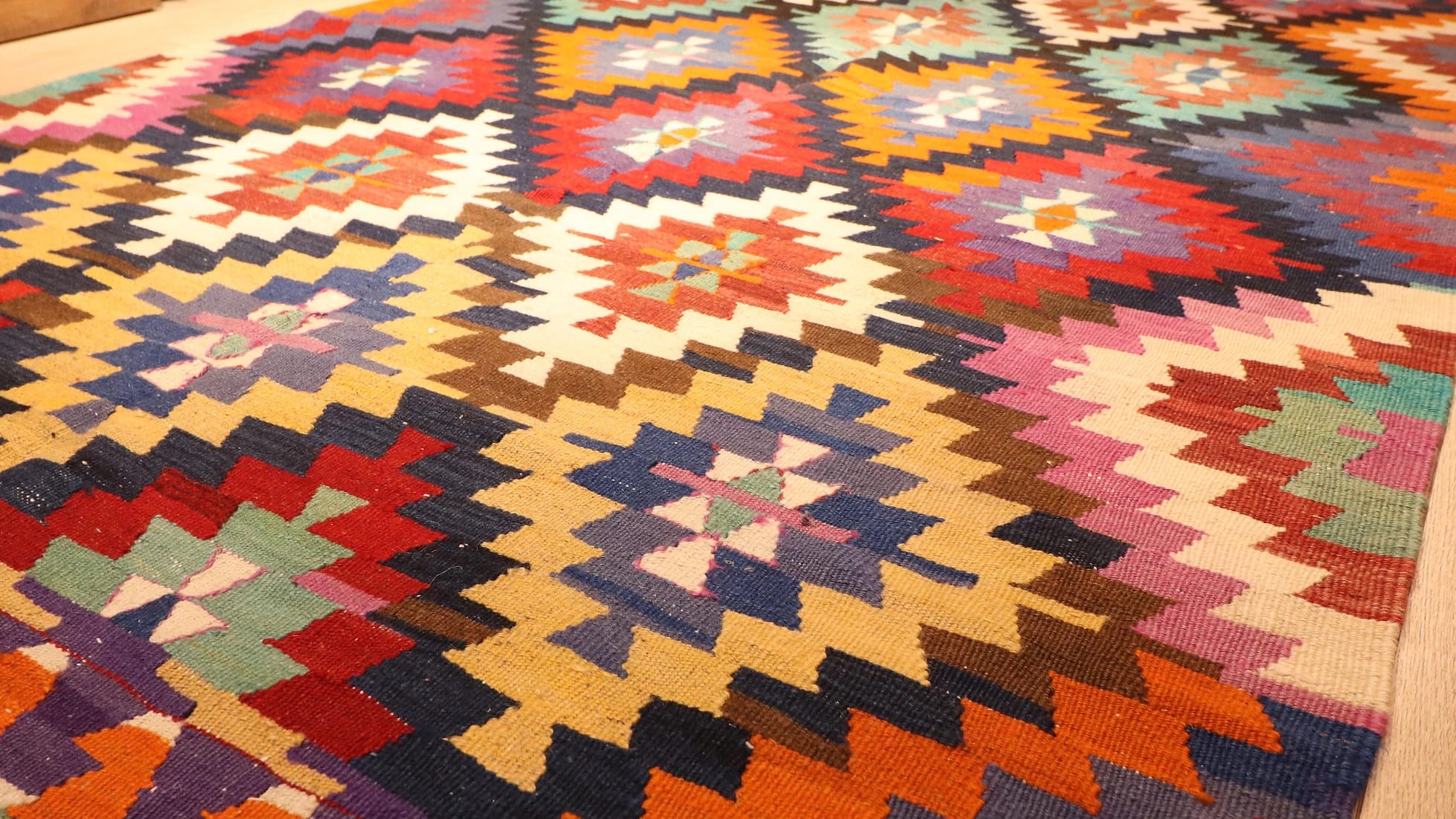 colorful, vibrant, and vivid ethnic Turkish tribal rug in traditional motifs