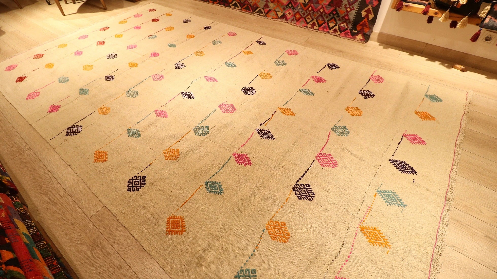 beautiful ivory flat-woven Turkish rug in bold colors in a contemporary and mid-century modern style