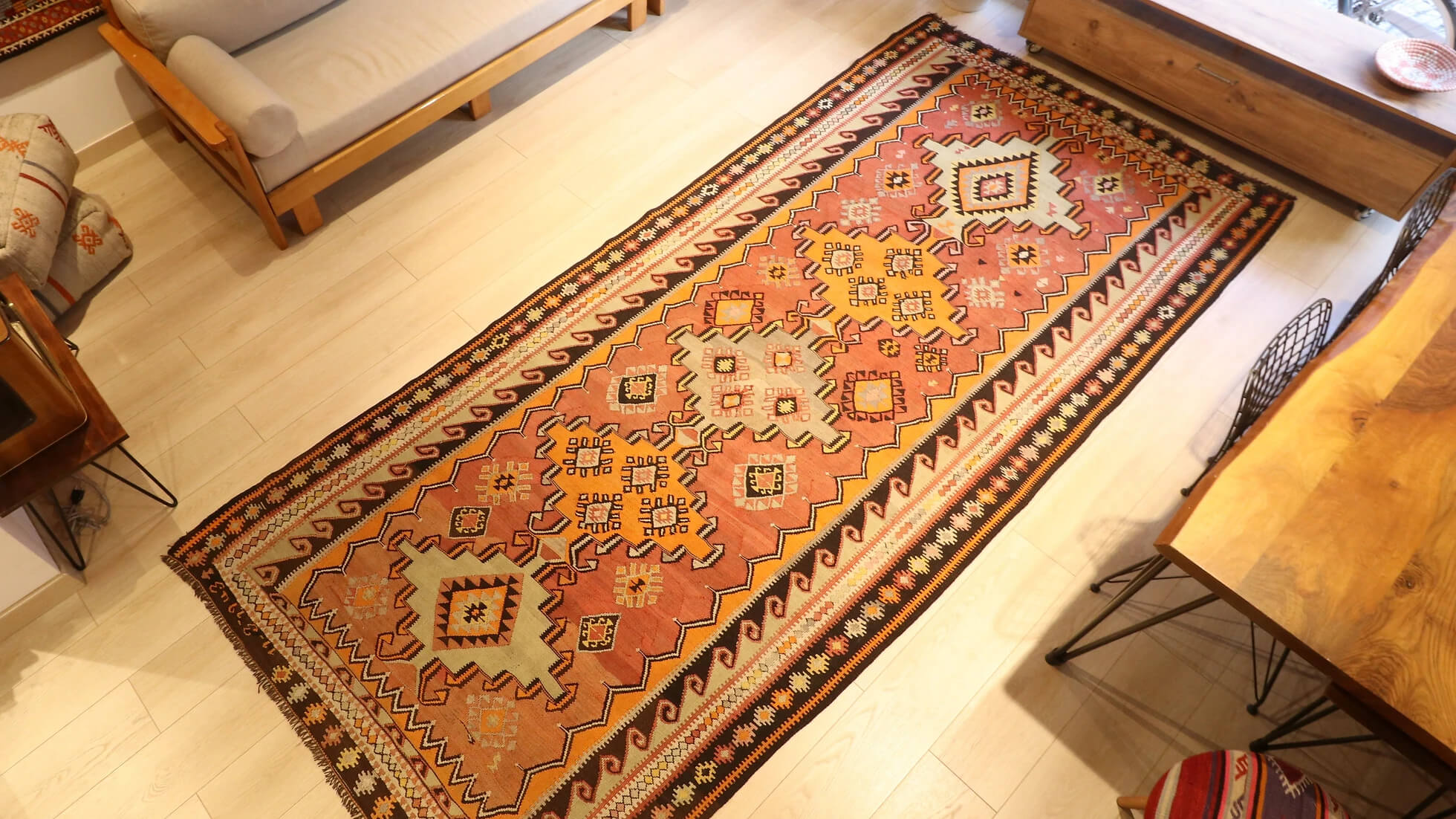 date signed vintage handwoven wool Kars runner rug for long hallway or gallery in tribal style with geometric patterns and medallions