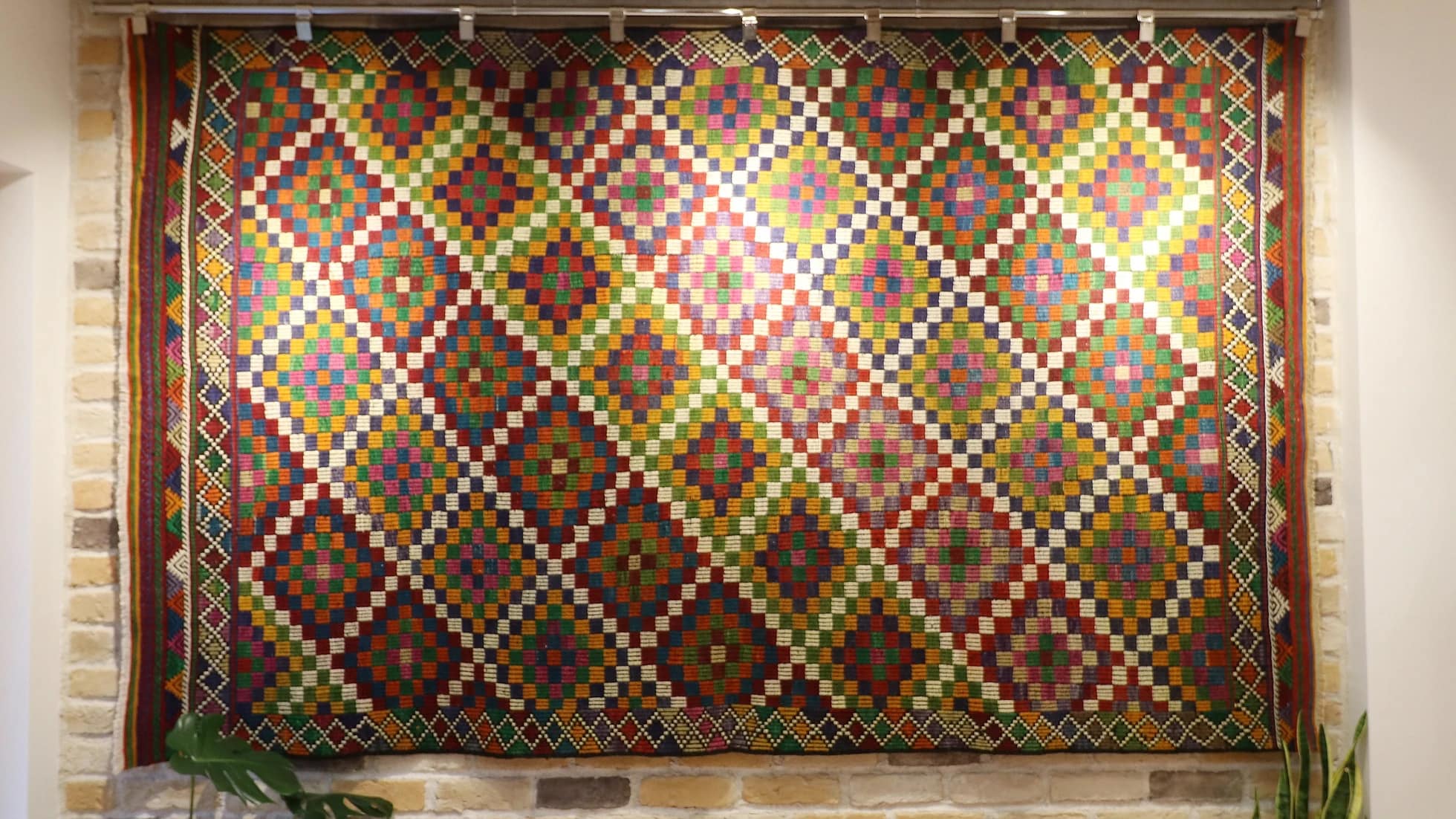 6x9 vintage Turkish cecim kilim rug with lozenge motifs in pink, purple, orange, red, green, and white