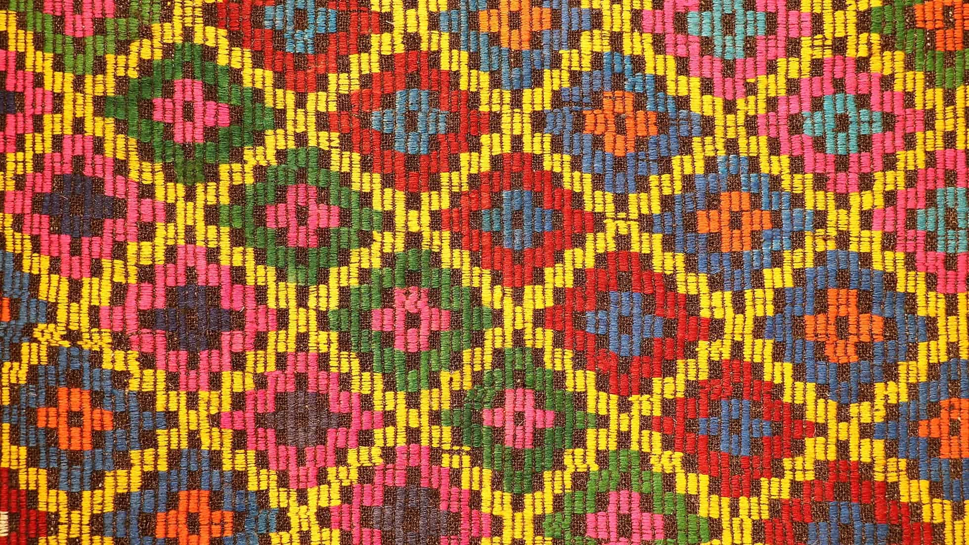 vintage mid-century geometric cecim rug with diamond patterns in vivid and vibrant colorful hues by Kilim Couture New York