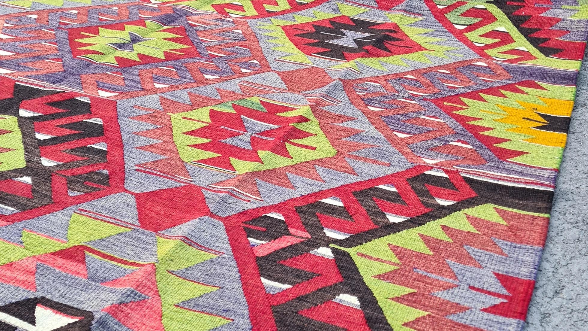 vintage Turkish handwoven tribal and geometric kilim rug from Manisa in rich rustic tones