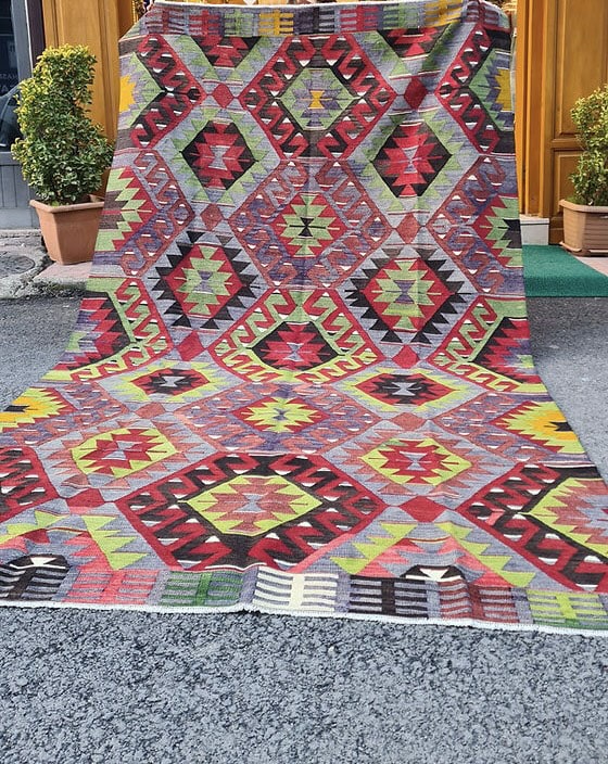 vintage Turkish handwoven tribal and geometric kilim rug from Manisa in rich rustic tones