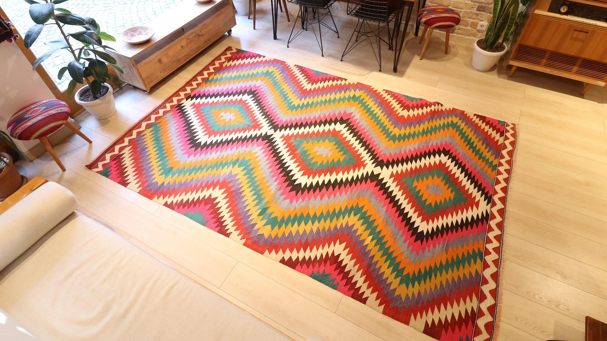 a very rare Turkish mid-century modern wool flat-weave rug in vibrant and colorful diamond and lozenge patterns in contemporary style