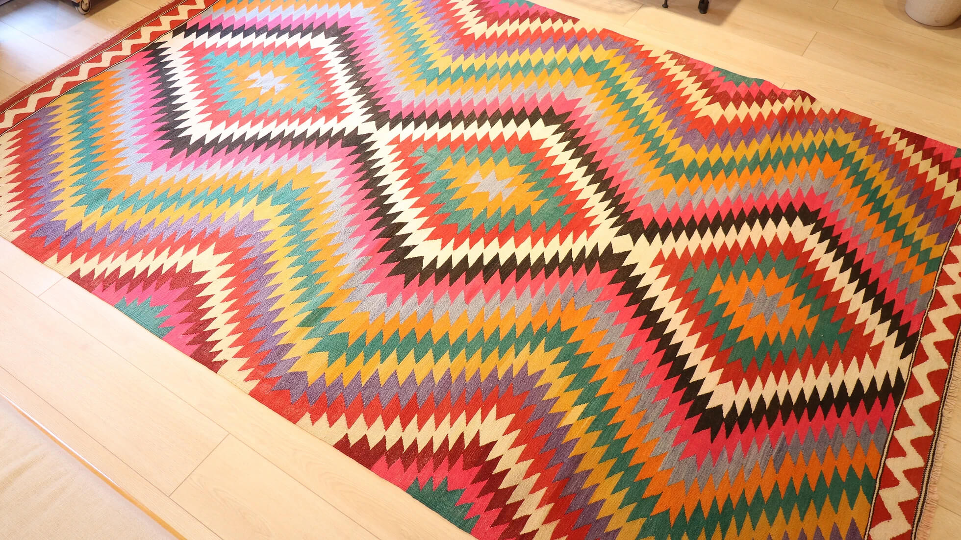 a very rare Turkish mid-century modern wool flat-weave rug in vibrant and colorful diamond and lozenge patterns in contemporary style
