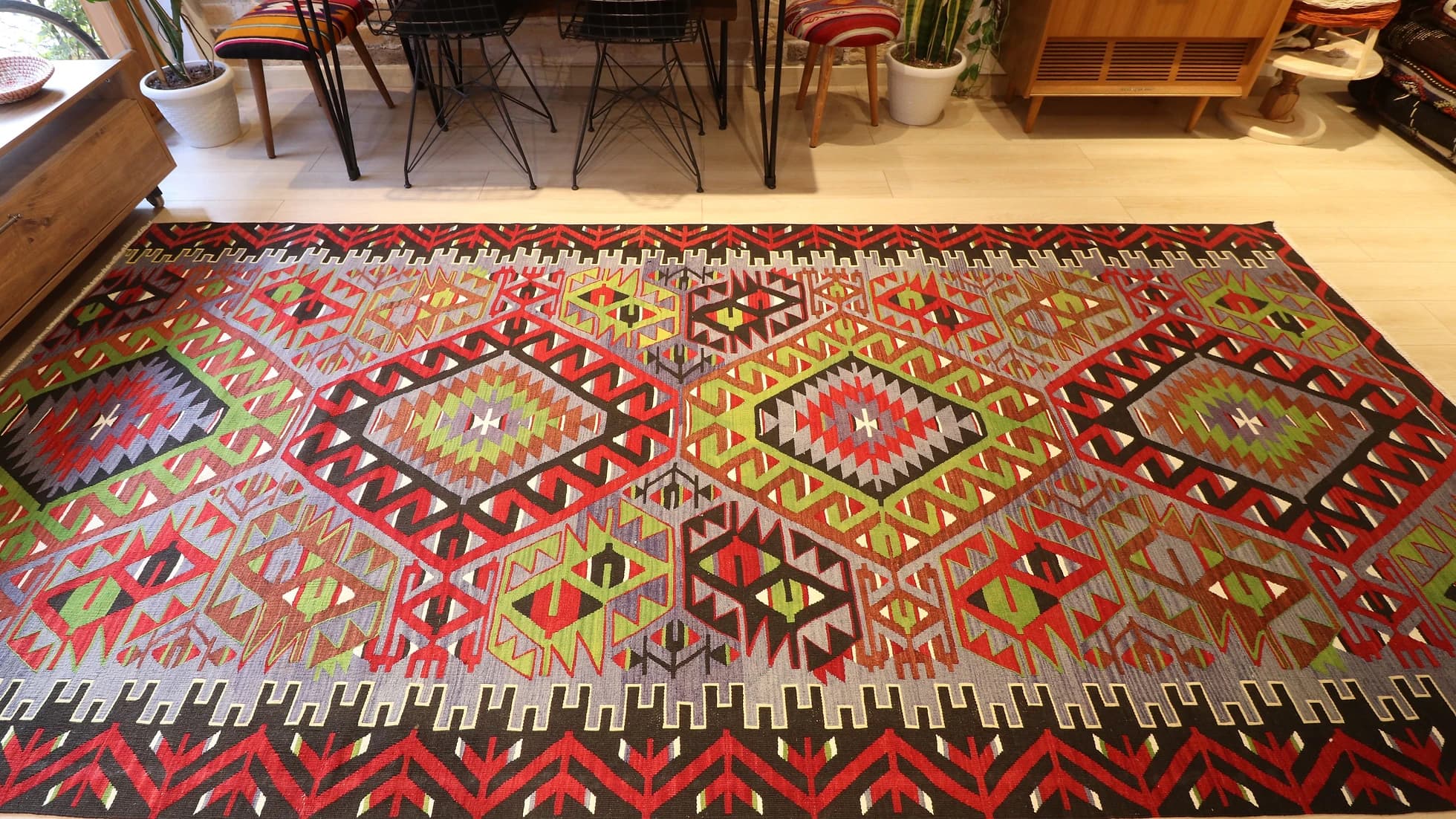 room size vintage Oushak runner rug adorned with tribal motifs in rustic earth tones by Kilim Couture New York