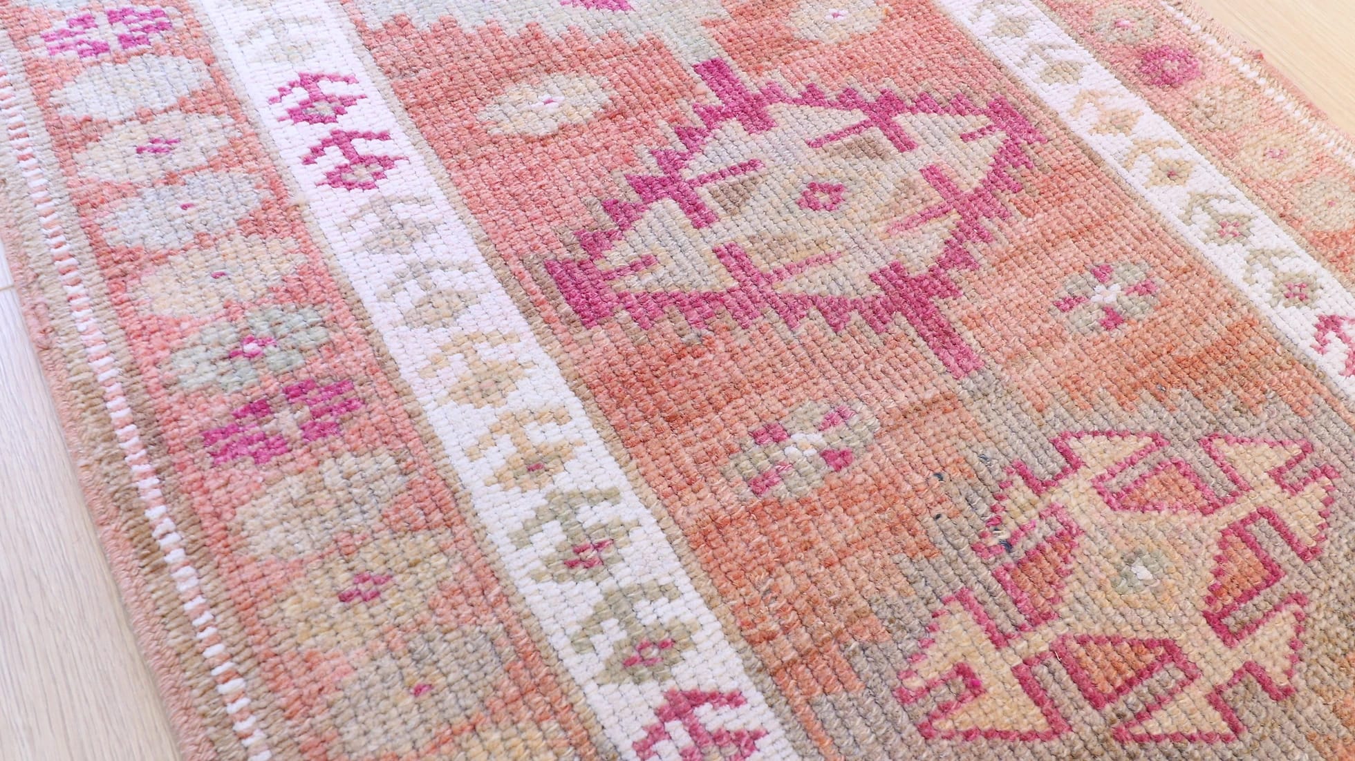 Gorgeous floral Oushak gallery oriental rug from Ushak in earthy, muted and pastel tones with geometric patterns