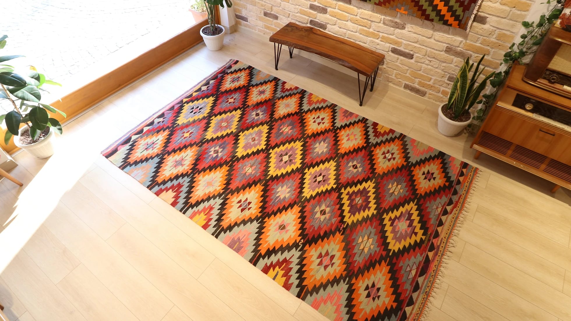 Turkish ethnic tribal rug featuring traditional motifs in vivid and vibrant colors from mid-century