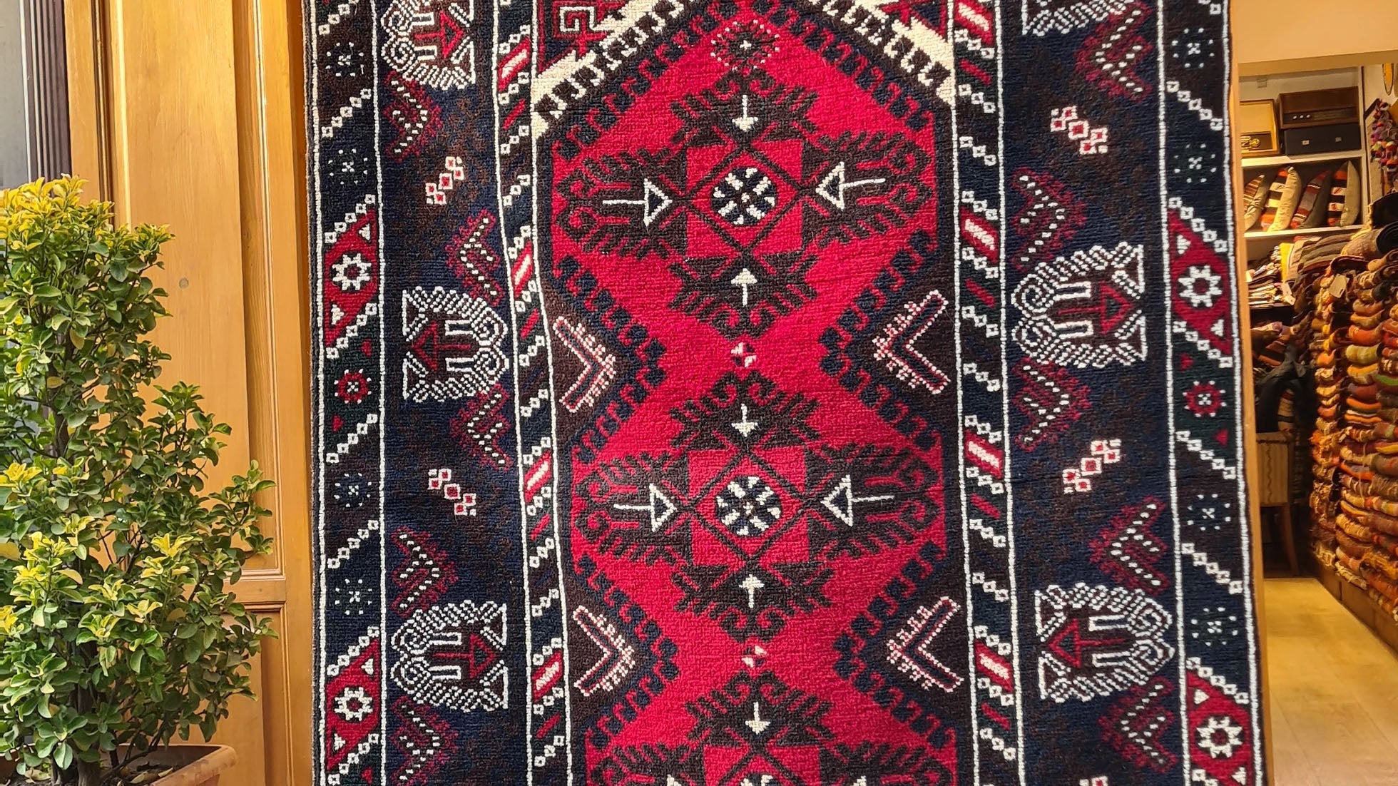 Vintage Dosemealti Oriental Rug from 1960s-1970s, 4x6 ft, handwoven in Antalya, Turkey, with Gordes knot. Features earthy tones of crimson, terracotta, beige, and blue with black accents, made from natural wool.