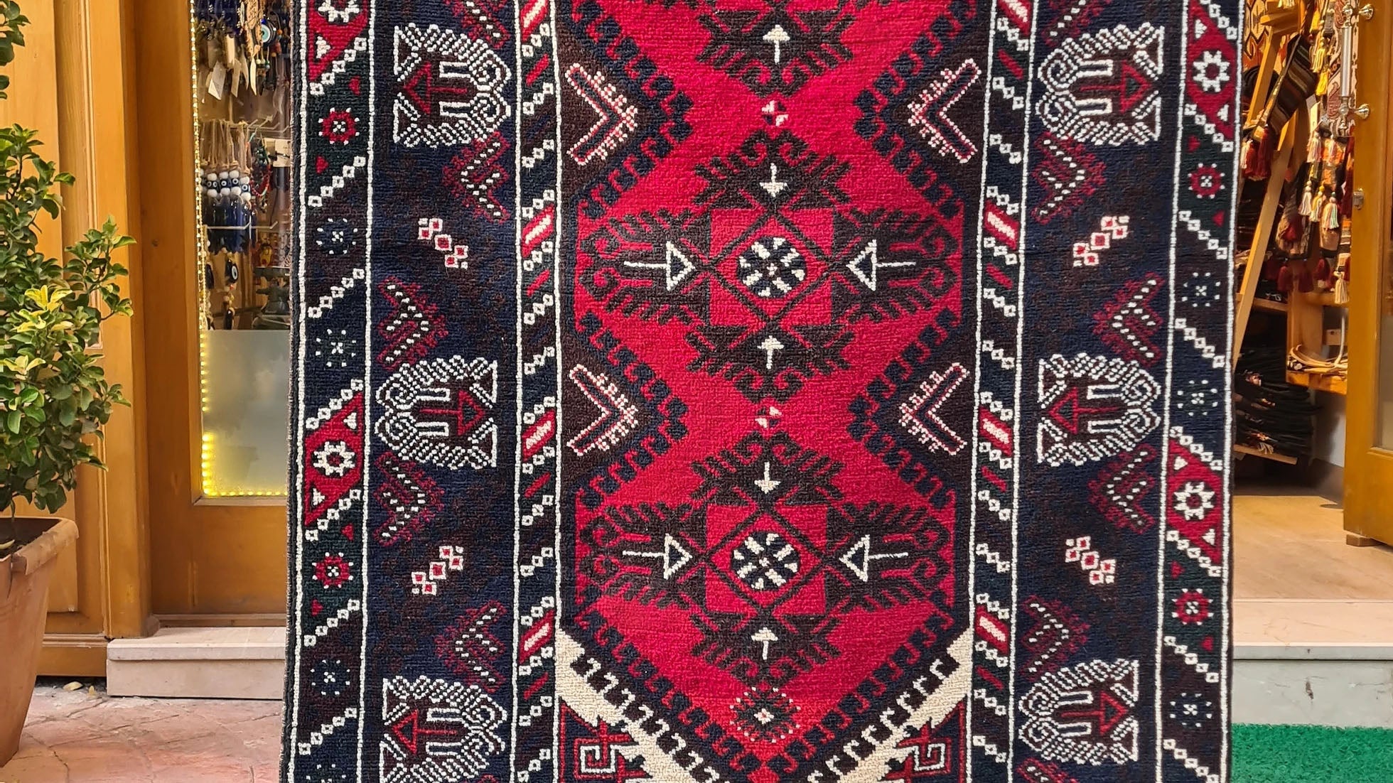 Vintage Dosemealti Oriental Rug from 1960s-1970s, 4x6 ft, handwoven in Antalya, Turkey, with Gordes knot. Features earthy tones of crimson, terracotta, beige, and blue with black accents, made from natural wool.