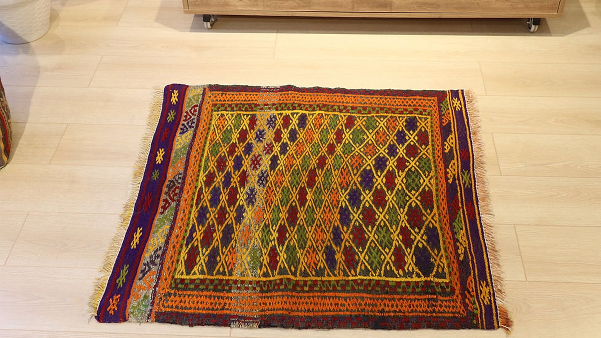 Vintage collector rug from Turkey featuring traditional motifs in vibrant colors
