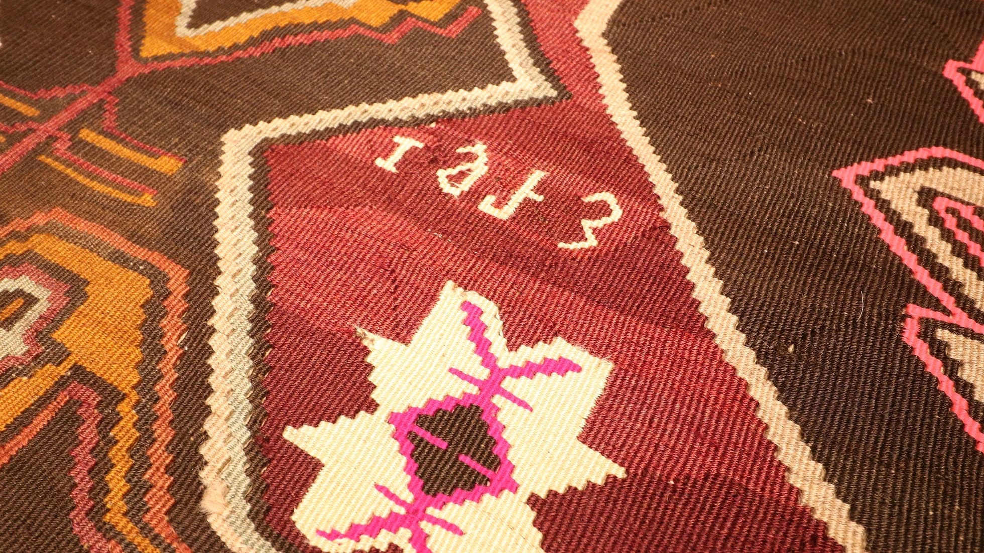 1973 date signature of Kurdish handwoven runner rug