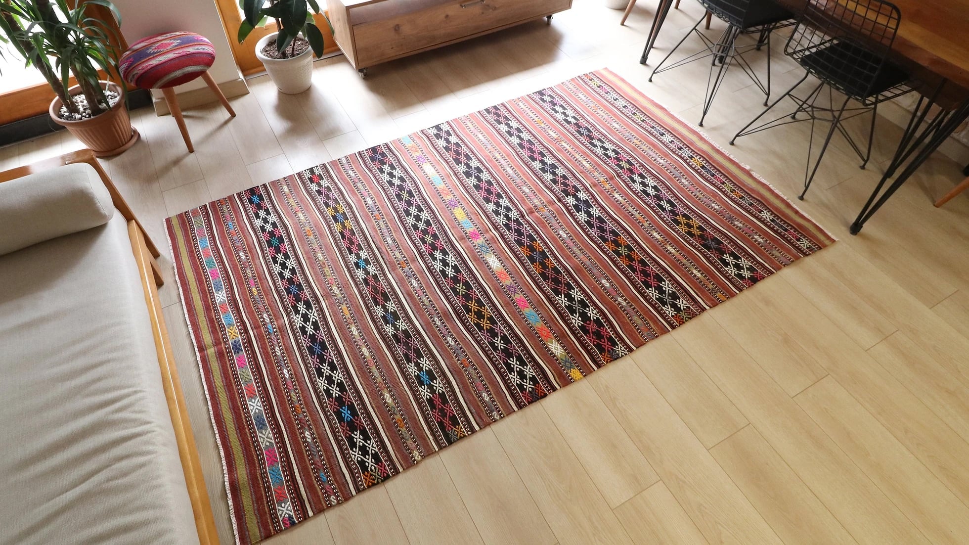a gorgeous vintage hand-knotted Turkish striped kilim rug in neutral rustic colors by Kilim Couture New York