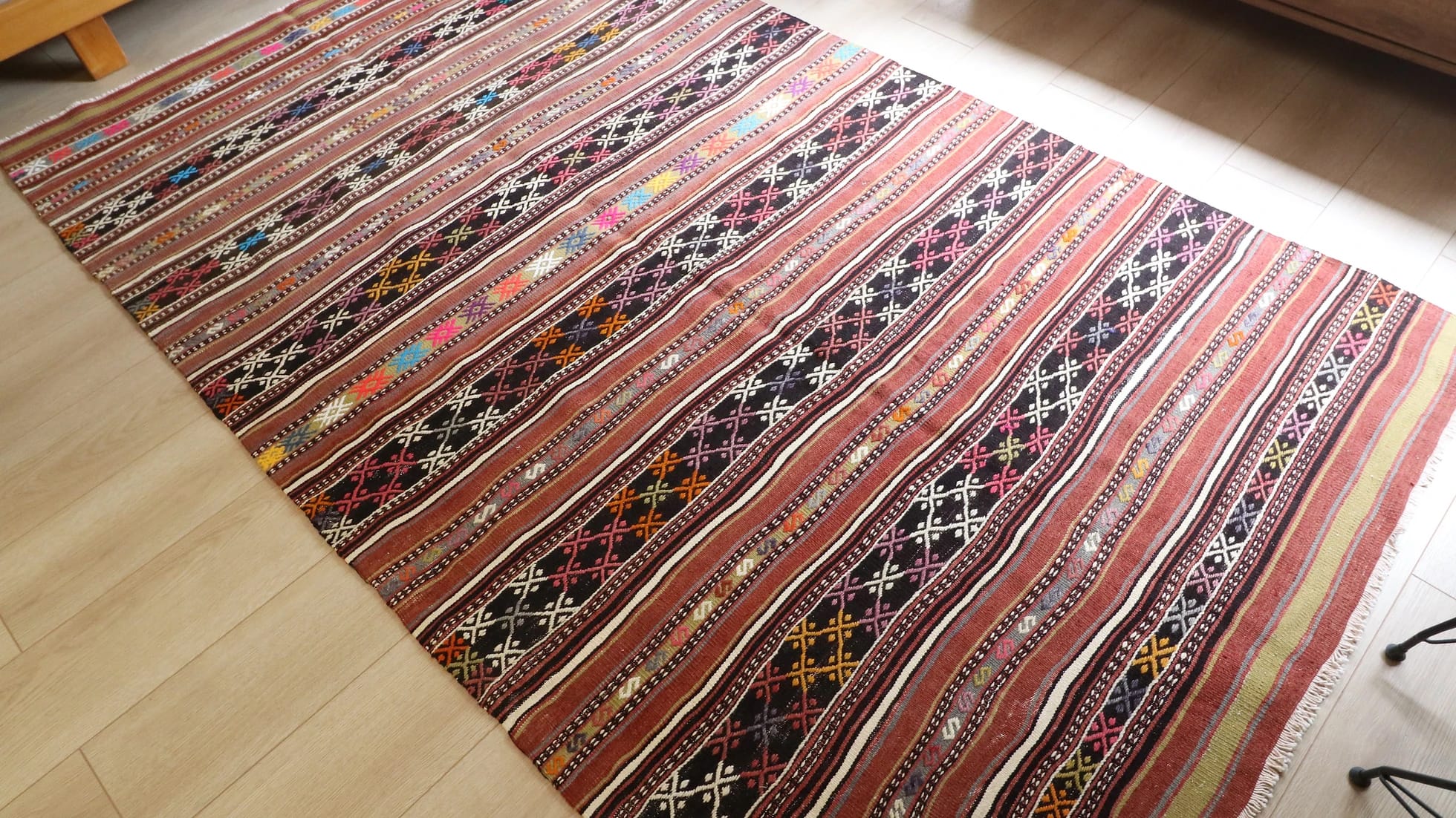 a gorgeous vintage hand-knotted Turkish striped kilim rug in neutral rustic colors by Kilim Couture New York