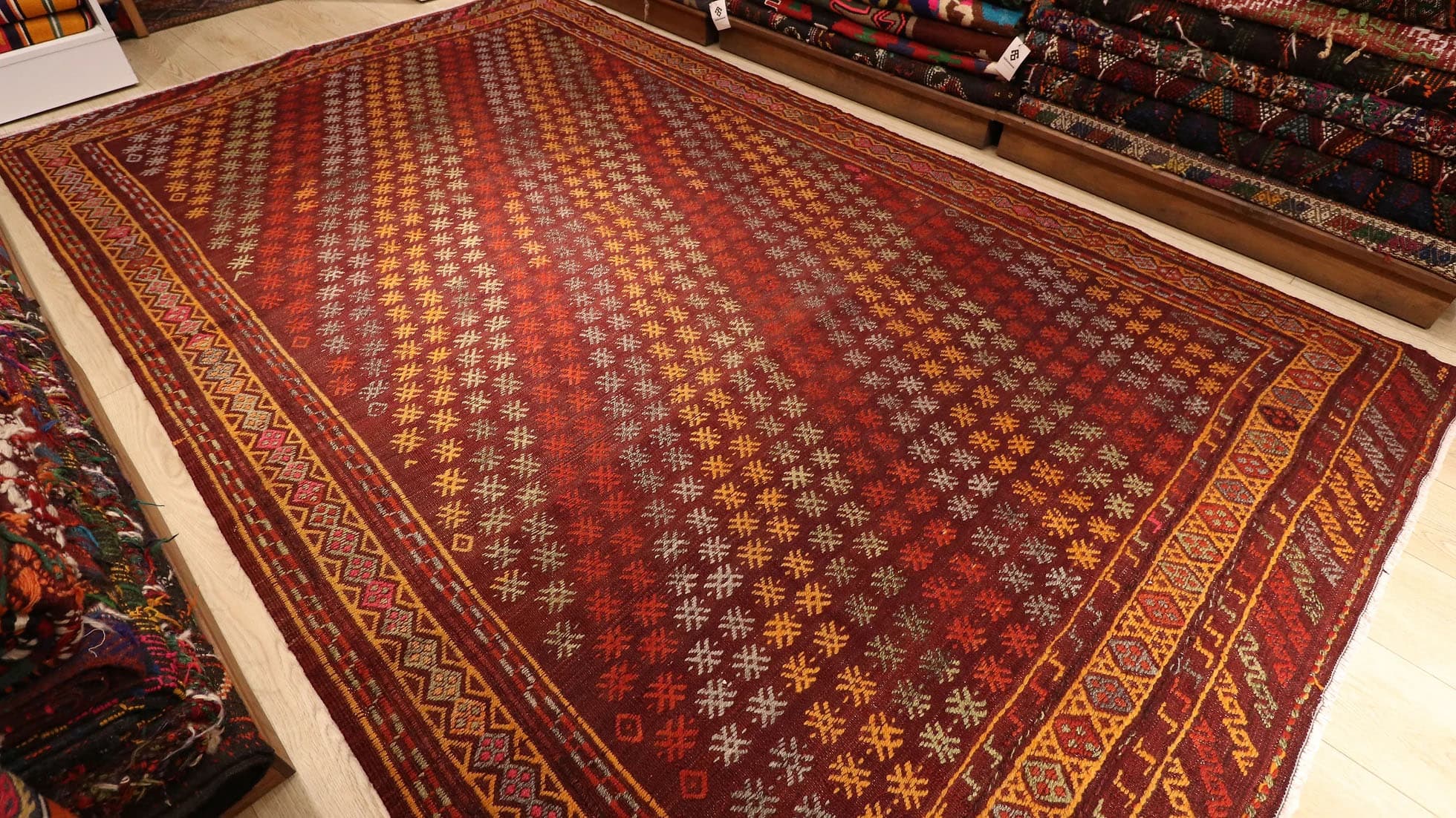 a majestic and rare Turkish flat oriental rug in red traditional motifs from Denizli