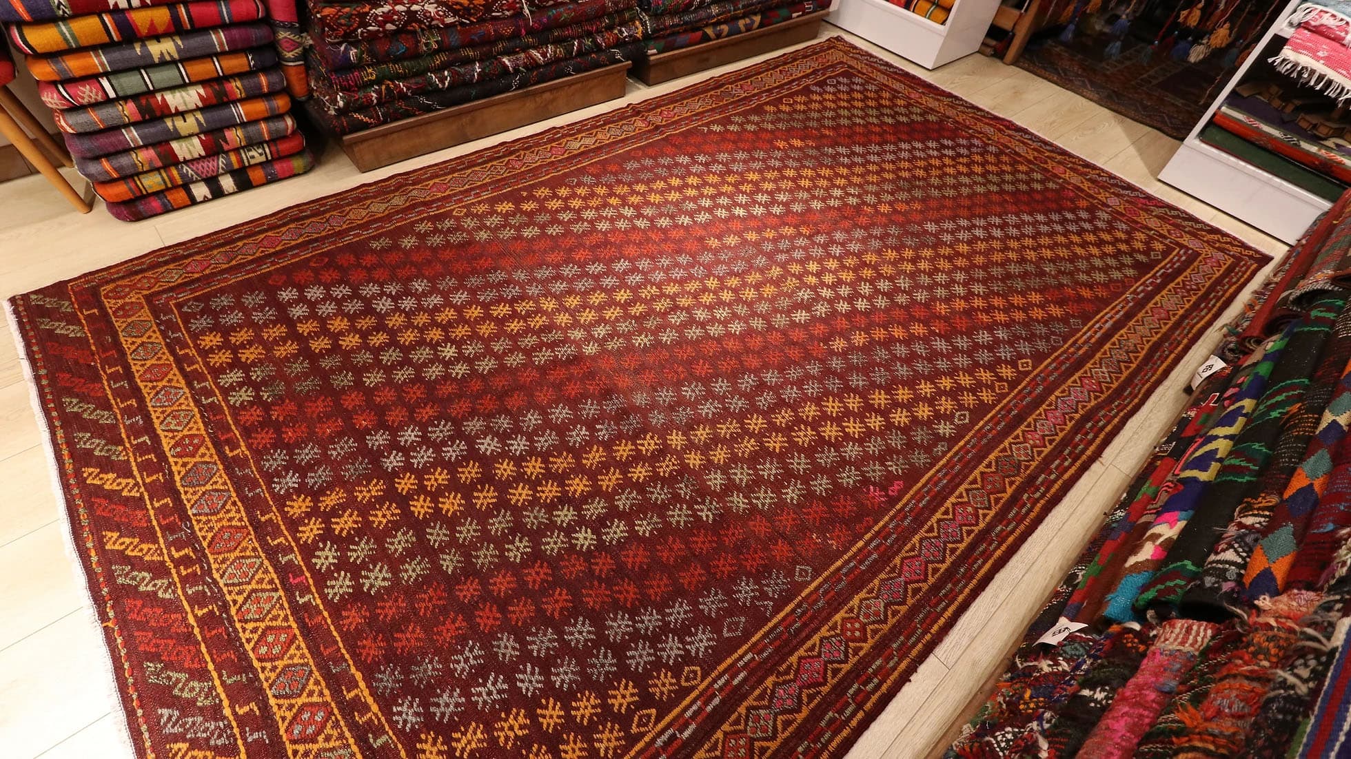 a majestic and rare Turkish flat oriental rug in red traditional motifs from Denizli