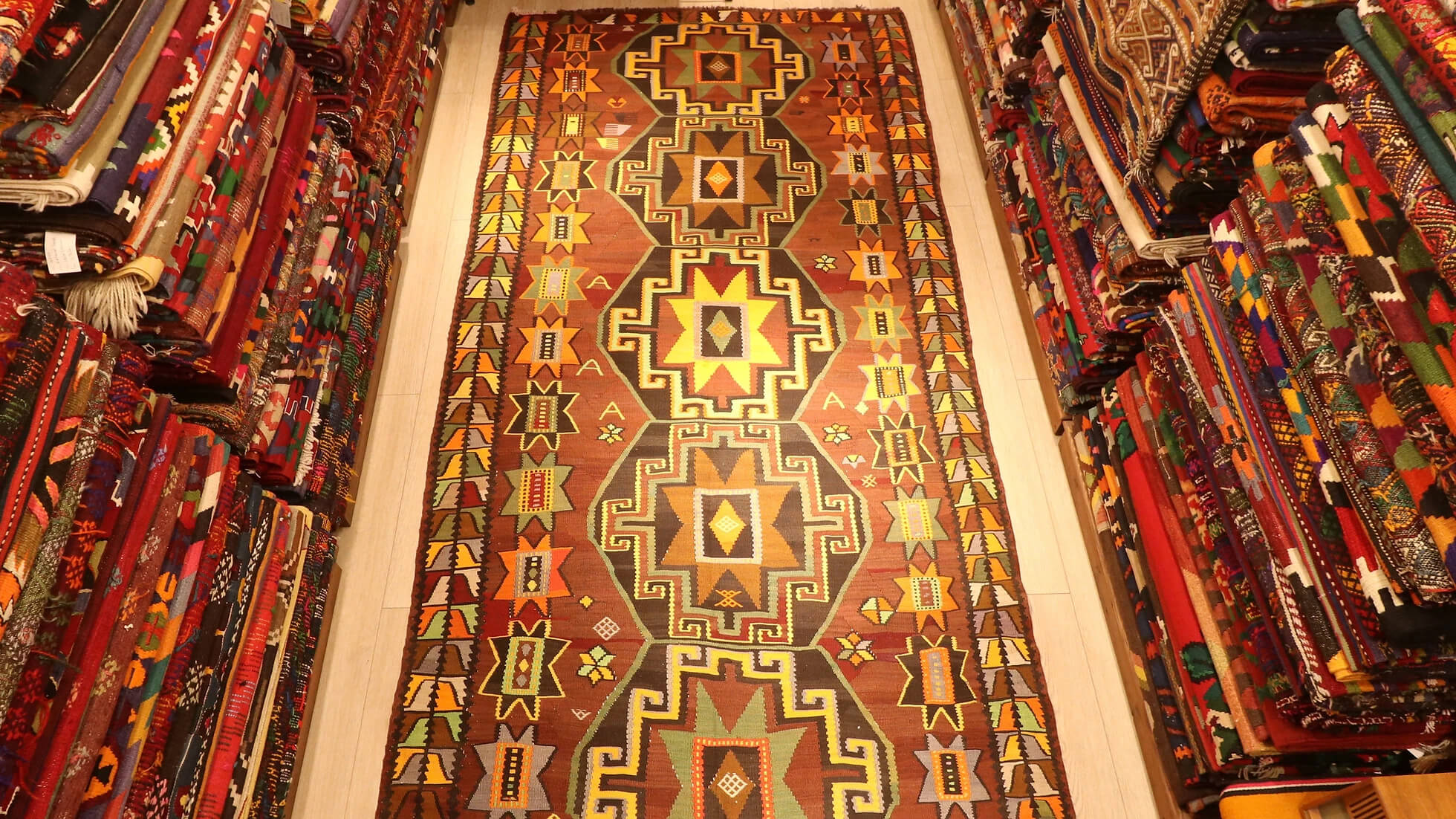 very rare Kars medallion Kurdish gallery runner rug signed by its local women weaver in muted earthy tones