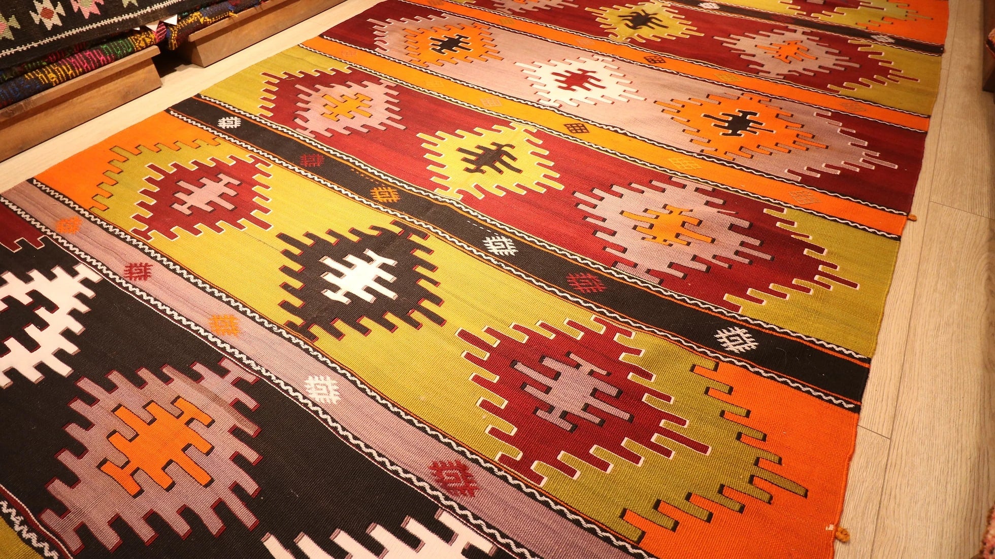 perfect Turkish rustic kilim runner rug in earth tones such as taupe, khaki, and brick red by Kilim Couture New York