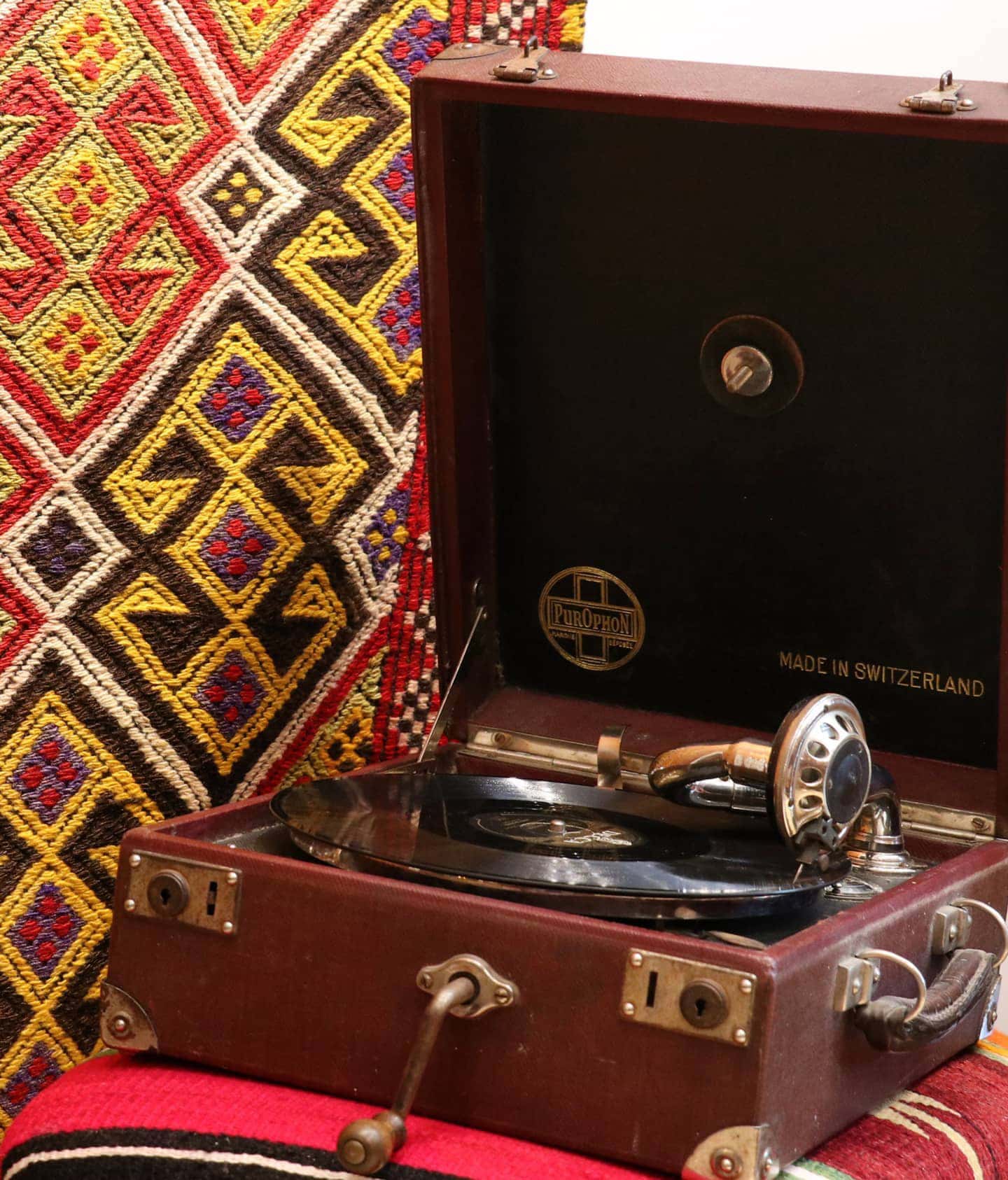 colorful handwoven oriental Turkish rug in wool featuring traditional tribal motifs from the mid-century