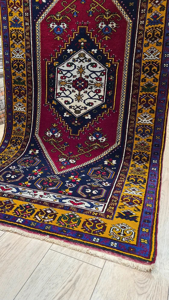 Hand-knotted 1950s Yahyali runner in rich terracotta, blue, and gold – a refined addition to modern, transitional, and classic design palettes at Kilim Couture New York.