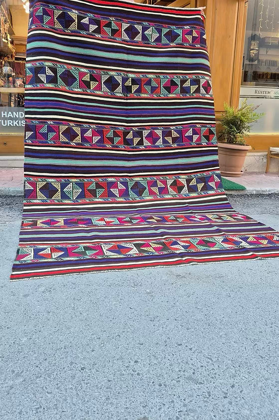 Handmade Anatolian flat-weave rug, 6x9 size, ideal for luxury interiors and set design