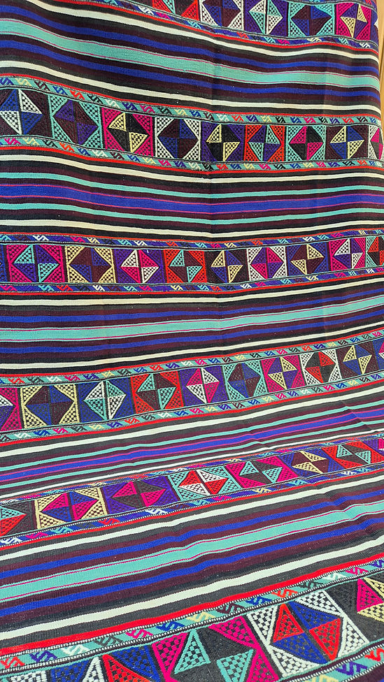 Colorful turkish textile kilim with geometric patterns and stripes