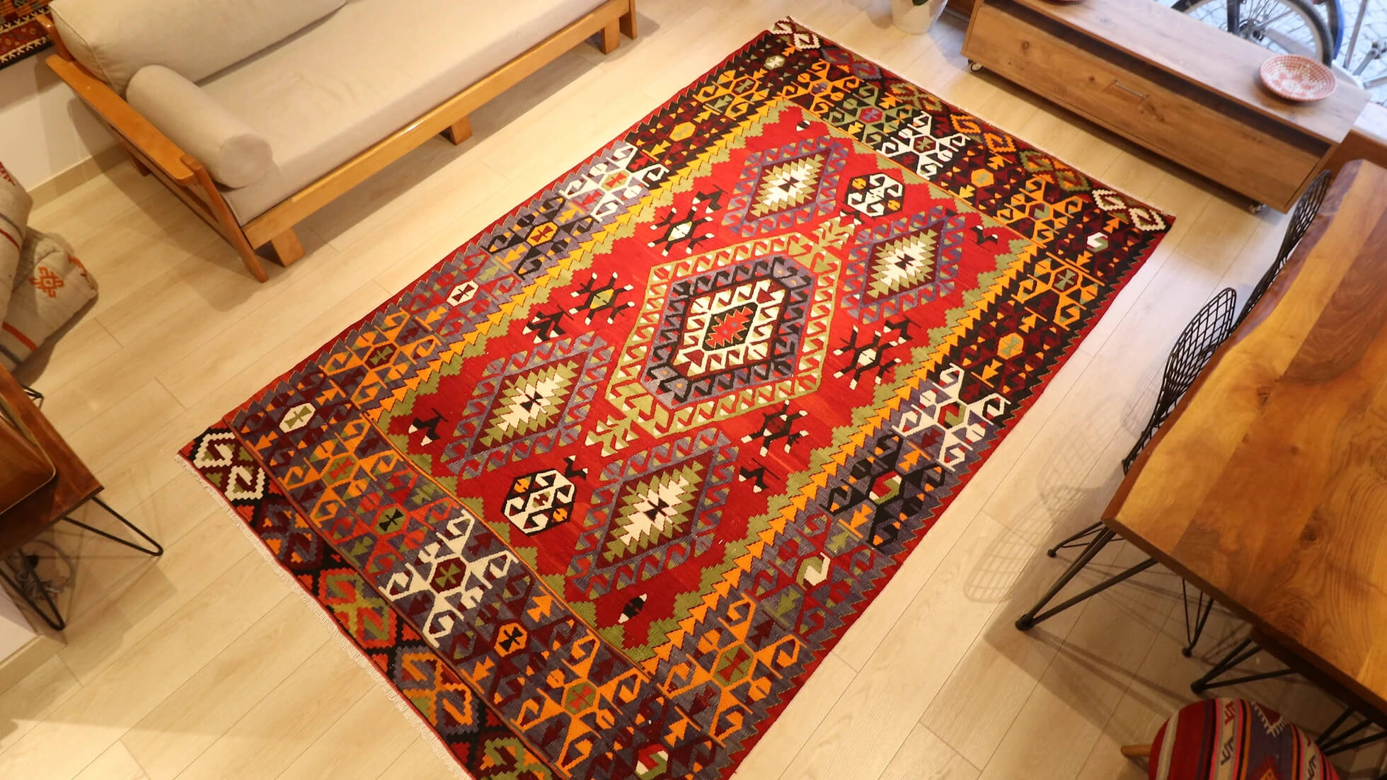 precious Cal oriental Turkish rug handwoven in 1960s featuring many traditional Anatolian motifs in passionate red and muted earth tones