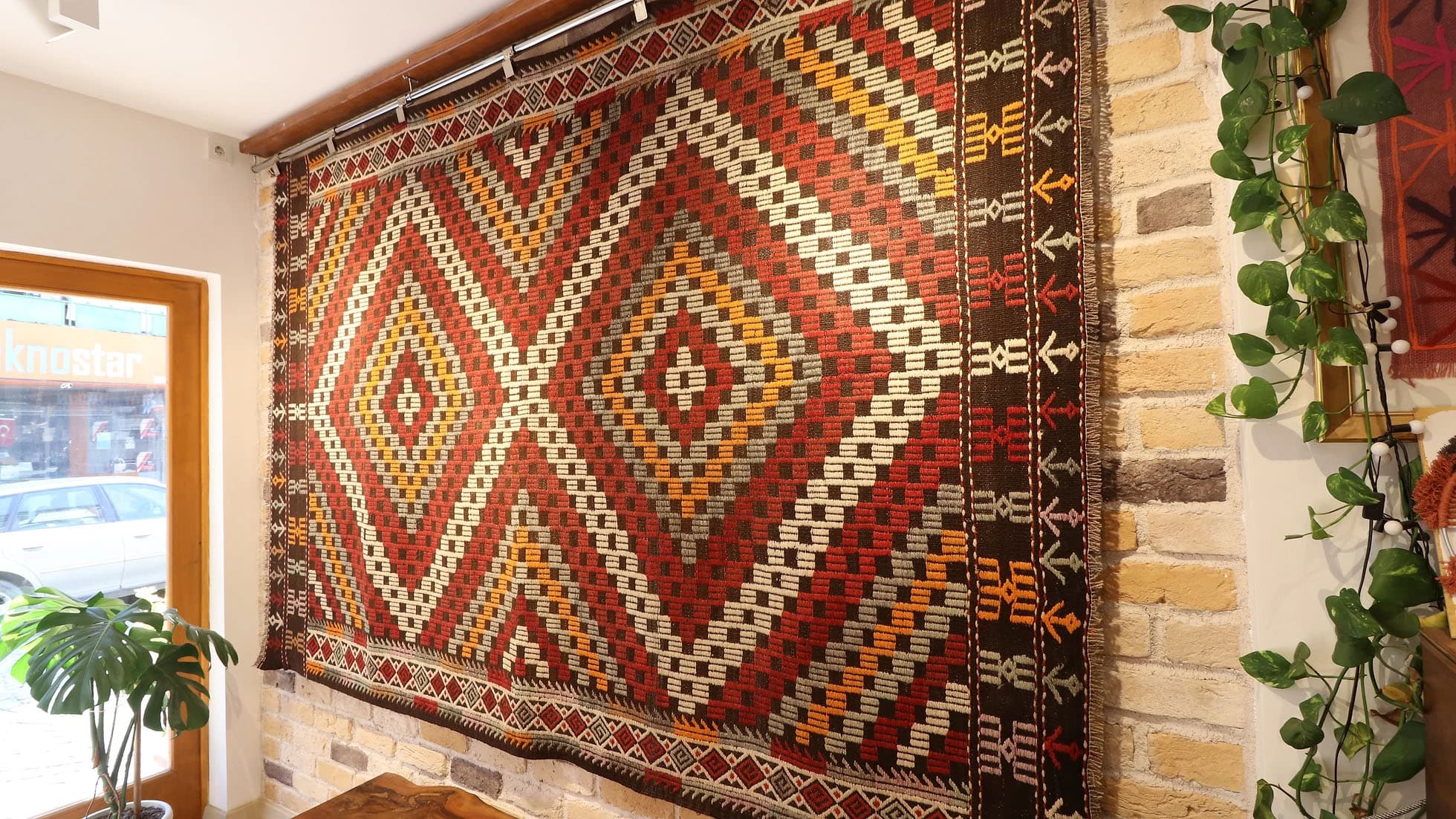 a very precious and luxurious vintage Turkish cecim kilim rug in pastel and rustic shades from mid-century '60s