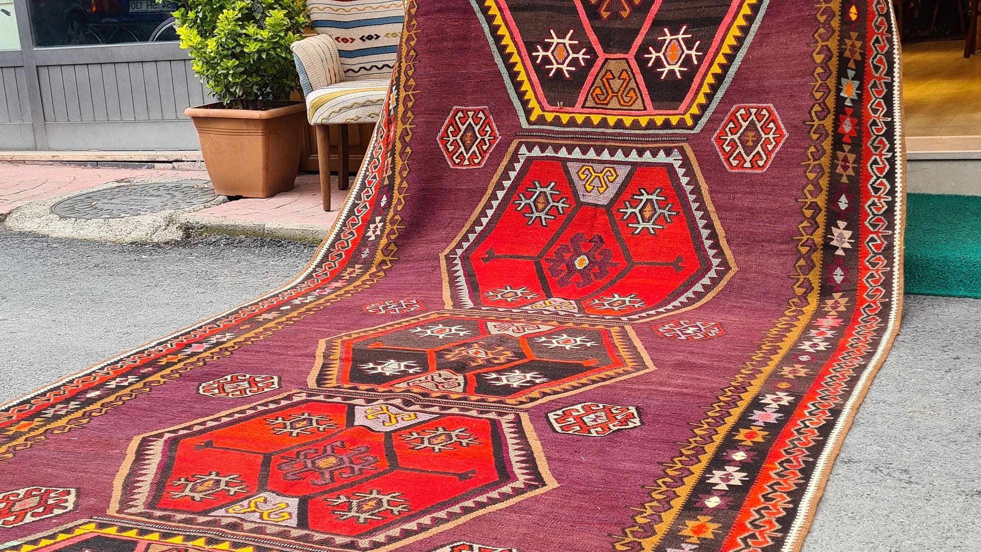 Vintage Turkish Handwoven Name Signed Kars Medallion Mid-Century Rug in Rustic Red, Burgundy, Pink