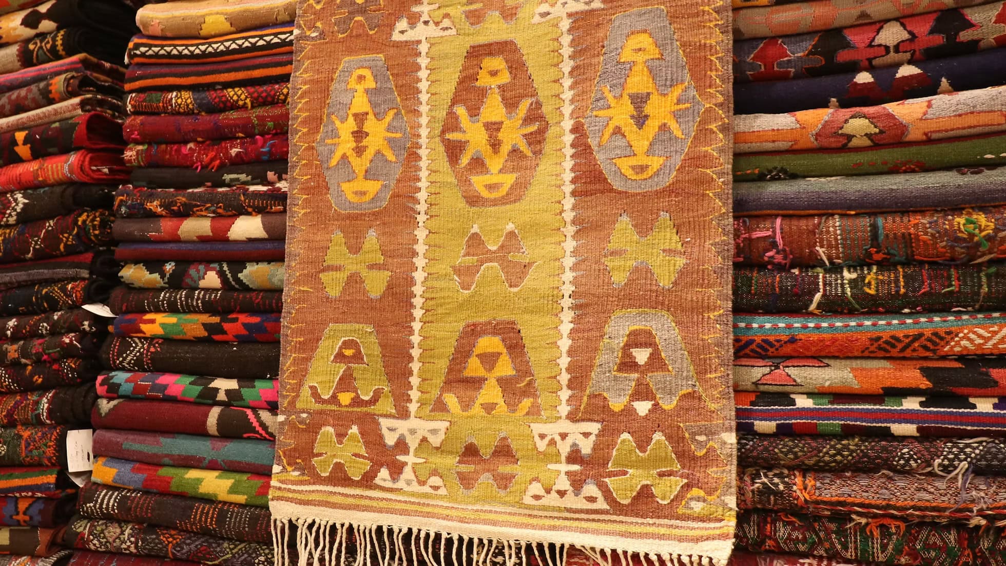 Vintage Barak kilim rug from Antalya, Turkey, featuring soft clay and pistachio mousse tones.