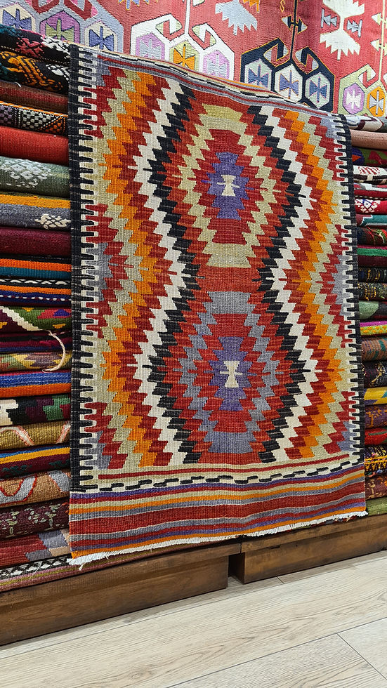 small Turkish area rug by Kilim Couture New York Rug Showroom