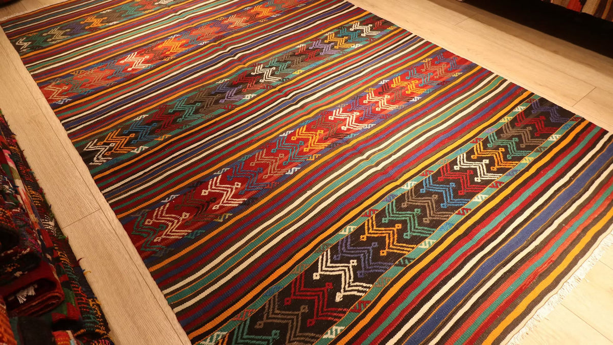 Mid-century flat-weave kilim rug from Turkey featuring delicate cicim patterns and a bold color combination of coastal blue tones.