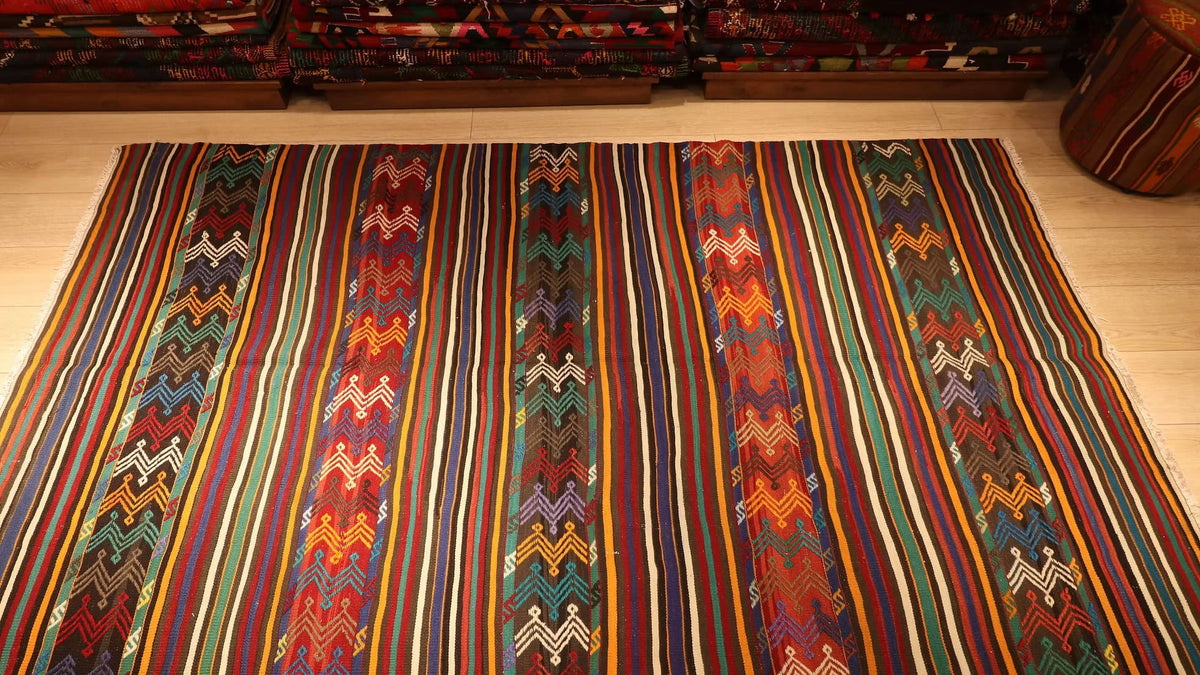 Turkish large area rug with detailed embroidery and a stunning palette of coral, aqua, indigo, and burnt sienna, crafted by skilled Aegean Yoruk tribes in the 1950s.