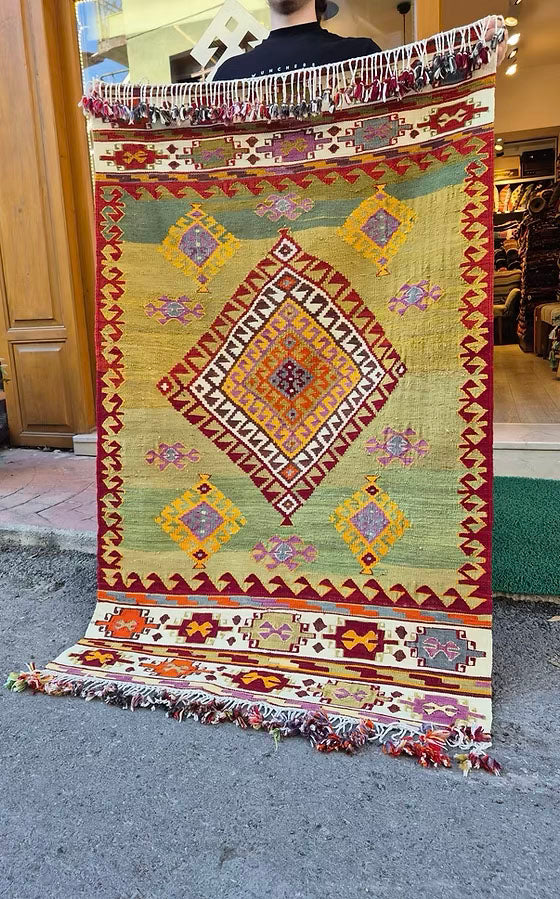 Flat-woven Turkish rug by Kilim Couture New York Rug Store in muted tones, designer rug for refined interior styling