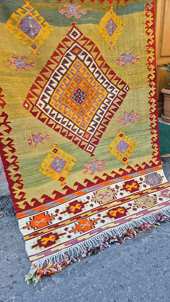 Handwoven rustic kilim rug in muted tones, perfect for cottage, luxury cabin, or modern farmhouse