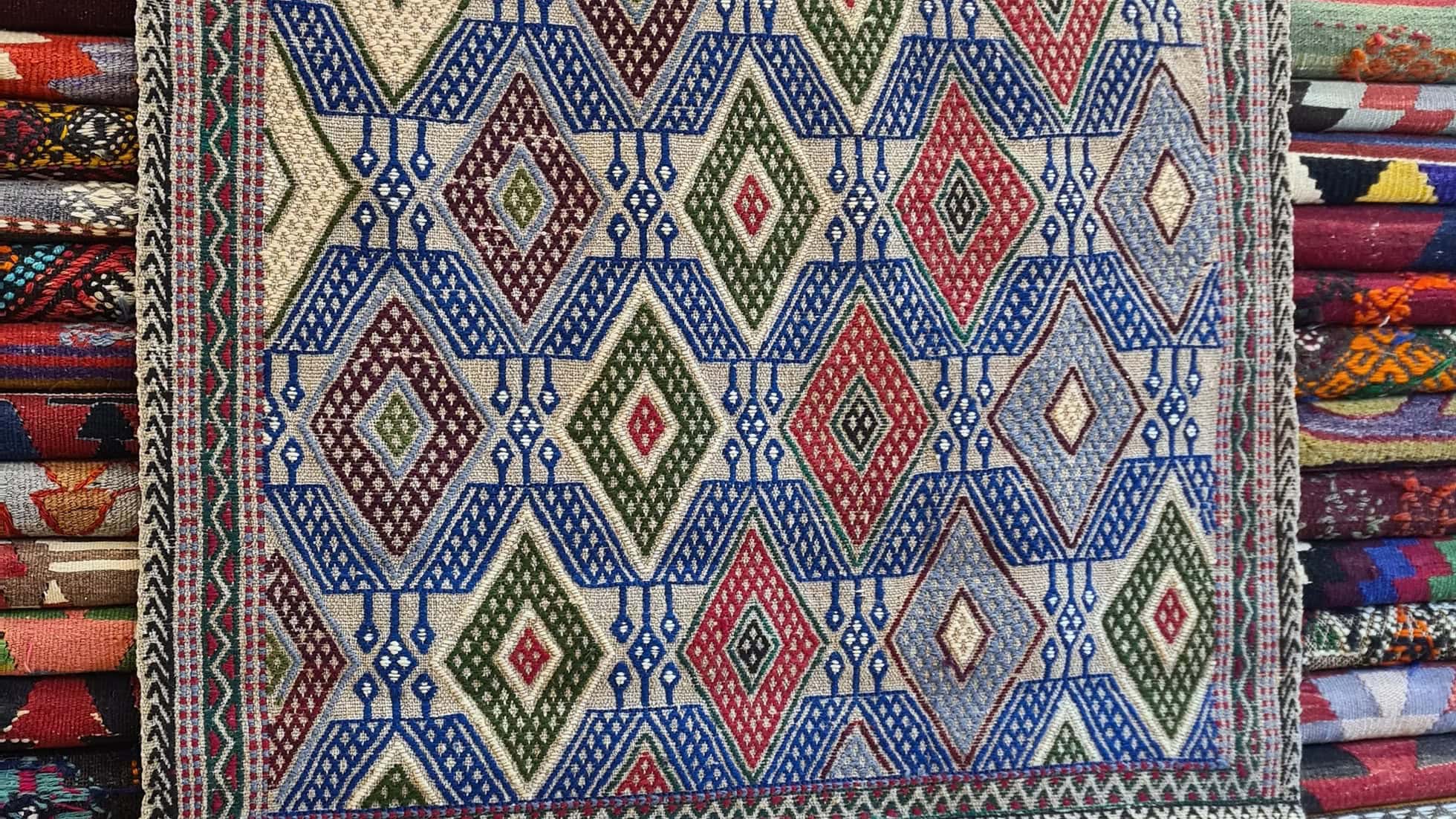 Vintage Turkish Cecim Kilim Rug with Evil Eye Motifs in Ivory Pearl and Submarine Blue by Kilim Couture New York Rug Gallery
