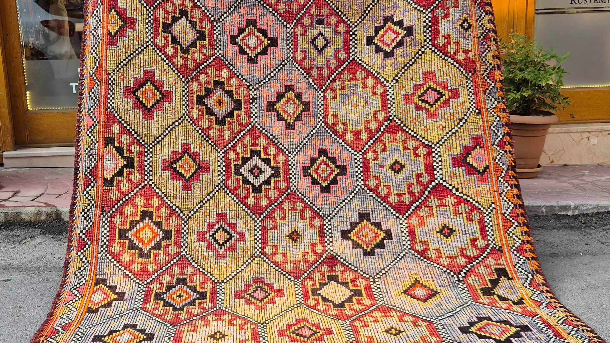 Decorative Turkish quilt rug with geometric pattern measuring 6x9
