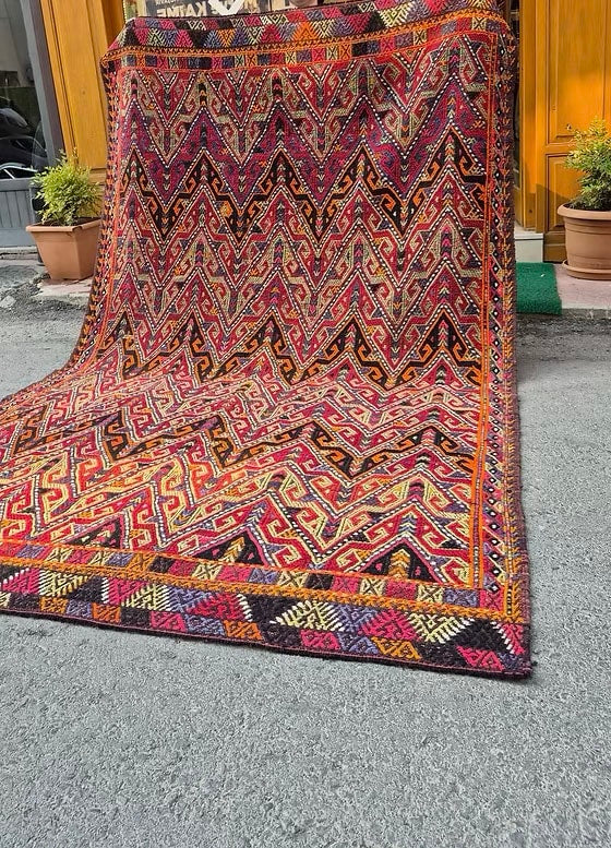 Designer Turkish Rug featuring bold geometric deisgn for interiors combining rustic charm and modern aesthetic for creative projects.