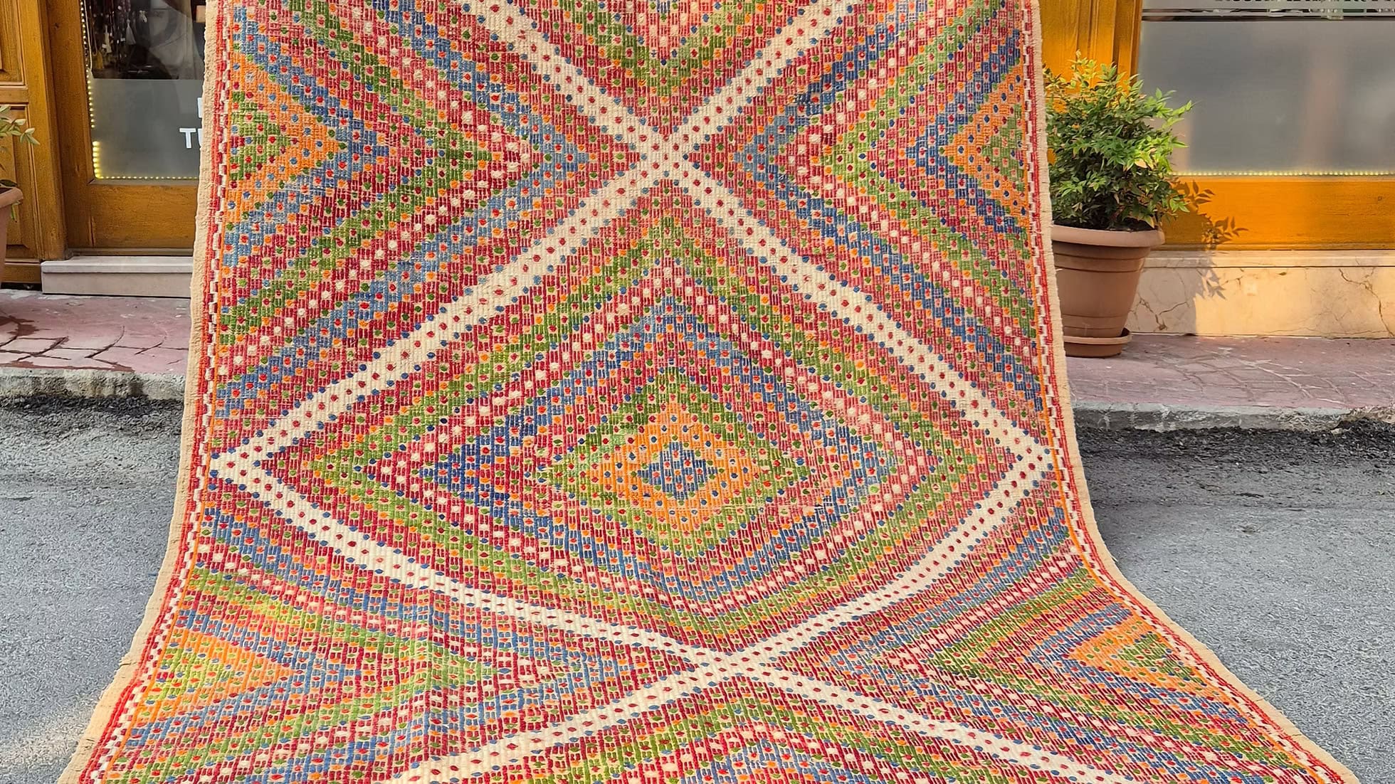 Handwoven vintage Konya Soumak rug showcasing intricate tribal geometric patterns and detailed brocading.