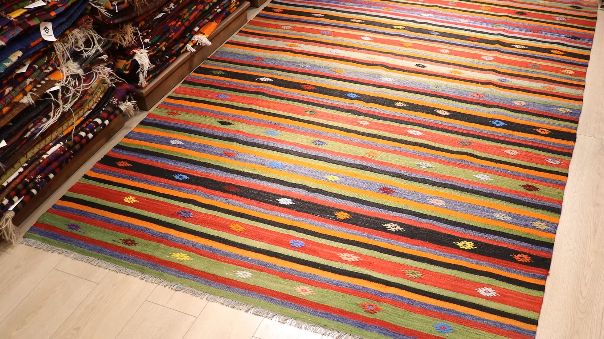 6x9 Vintage Cecim Kilim rug from the 1960s with tribal stripes and motifs, handwoven with a color palette of earth tones