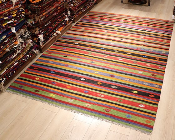 6x9 Vintage Cecim Kilim rug from the 1960s with tribal stripes and motifs, handwoven with a color palette of earth tones